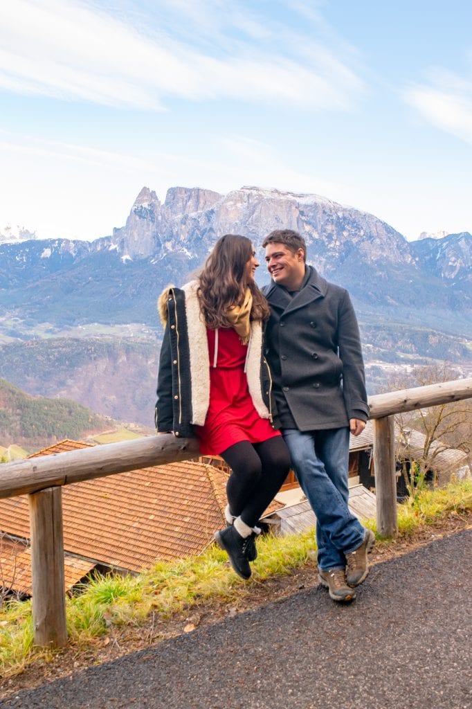 Couple in Soprabolzano: these coats are a great example of what to add to your packing list for Europe winter.