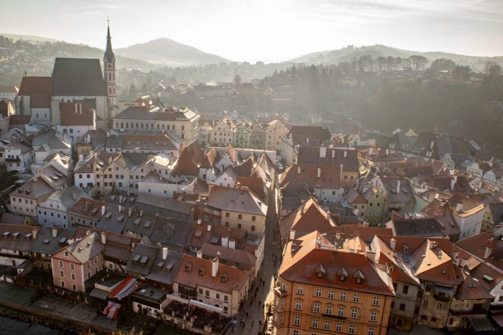 View of Cesky Krumlov from above with church to the left side of the photo