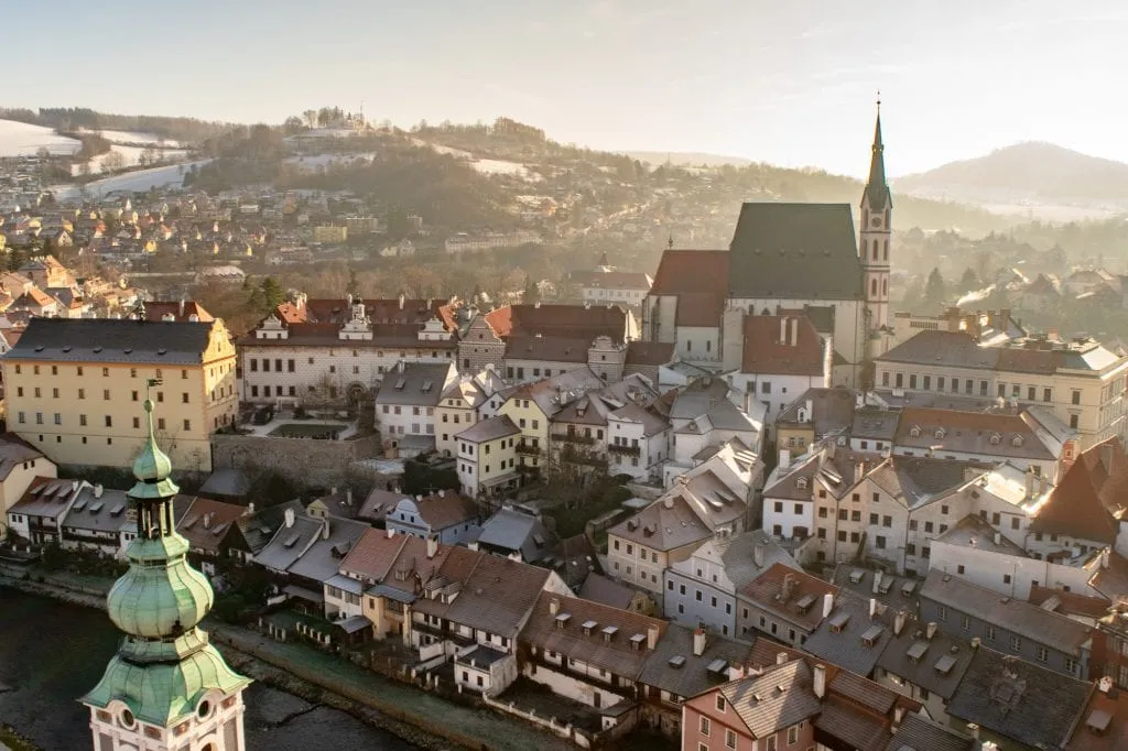 trip ideas to europe View of Cesky Krumlov from above--one of our top Europe travel tips is to leave the big cities to explore incredible small towns like this during your trip