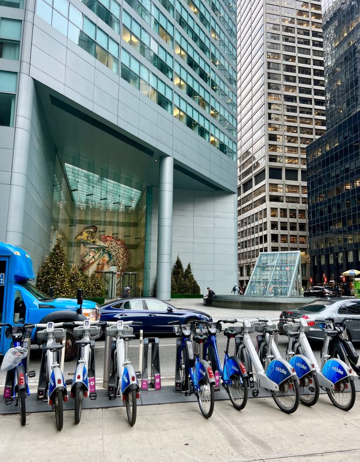 citi bike stand with several bikes parked in midtown manhattan new york city