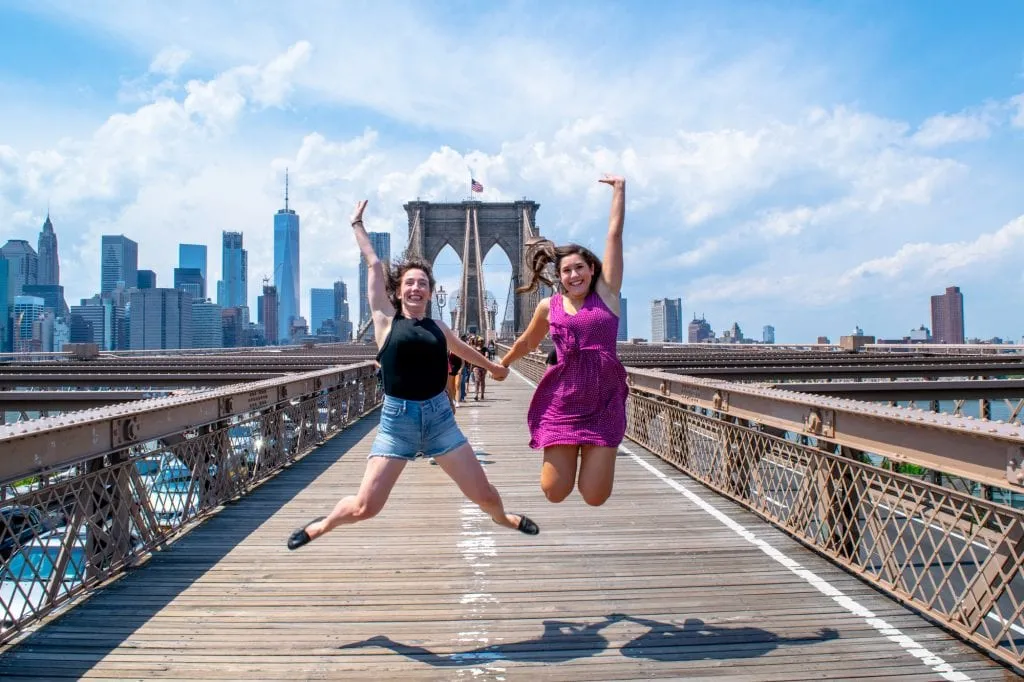 4 Days in New York Itinerary: Girls Jumping on Brooklyn Bridge