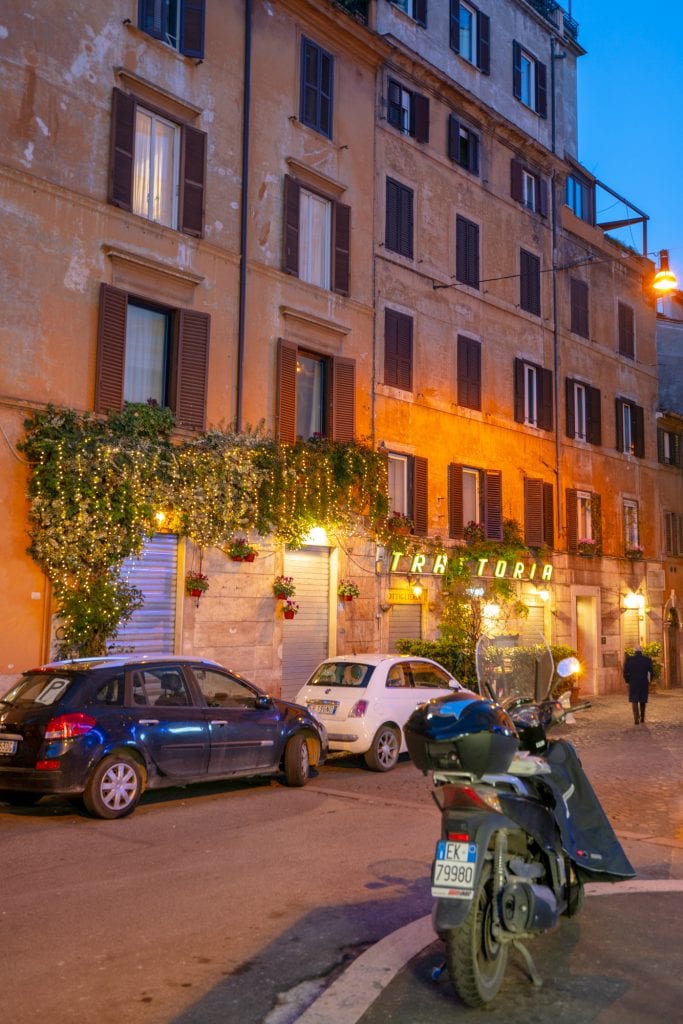 Street scene with Vespa in Rome at blue hour, What to do in Rome at night