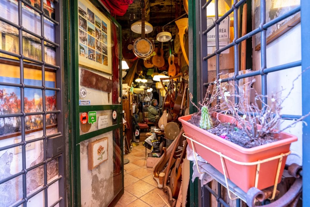interior of small Musical Instrument Shop trastevere rome