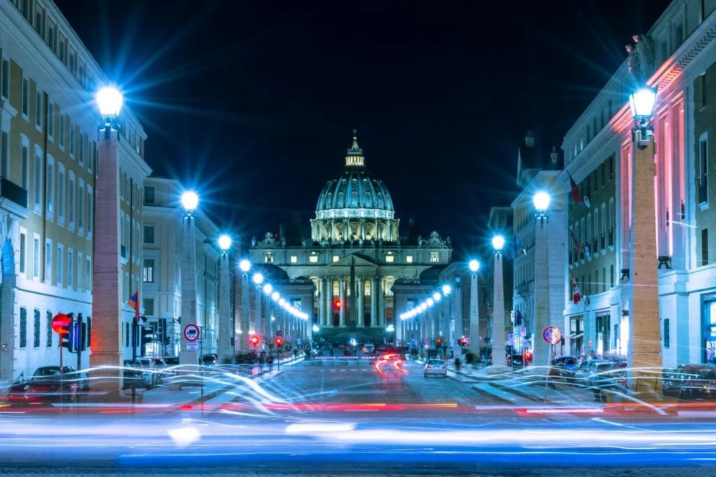vatican tour today St Peter's Basilica at night with traffic in front, What to do in Rome at night