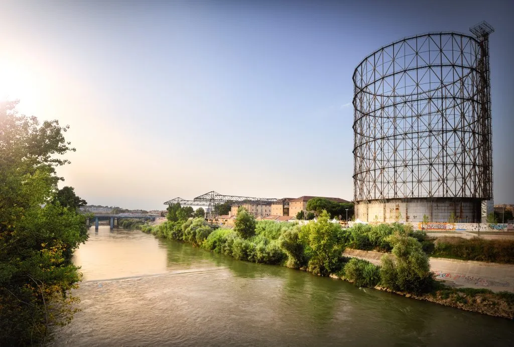 ostiense at sunset with the tiber river in the foreground