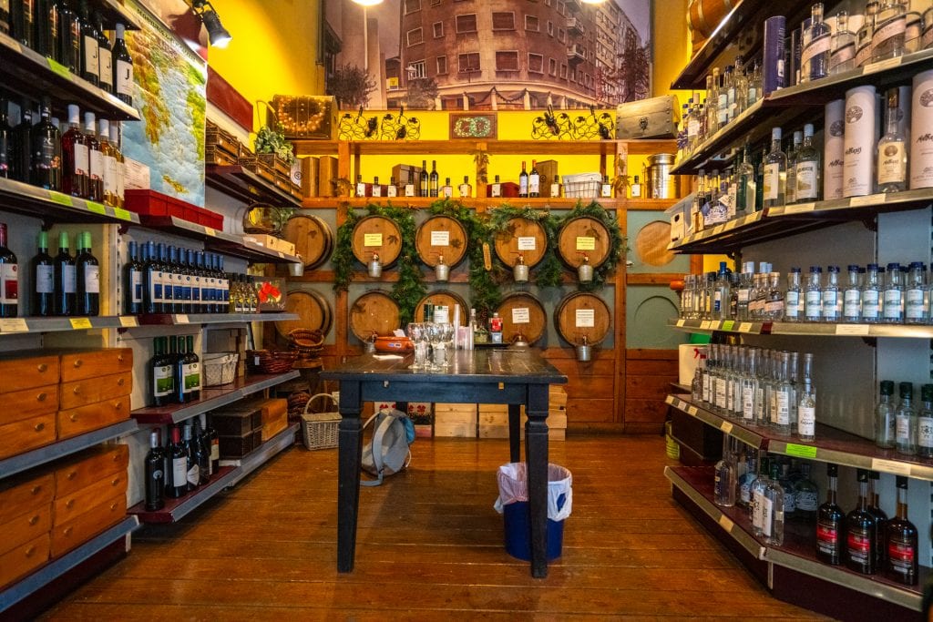 Overview of shop with wine barrels in Athens, Athens food tour