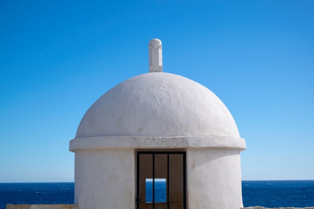 White Dome on dubrovnik city walls with blue sky background