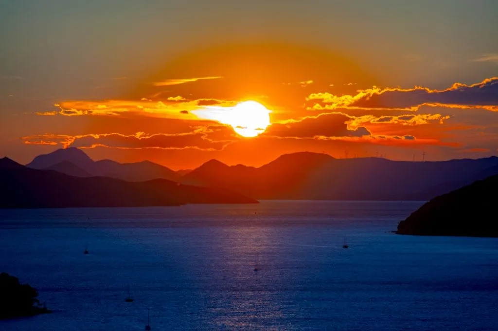 One Day Dubrovnik Itinerary: Sunset over Adriatic Sea with boats in front