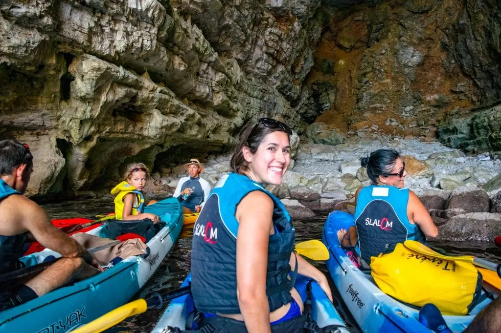 kate storm kayaking near dubrovnik croatia in a cave