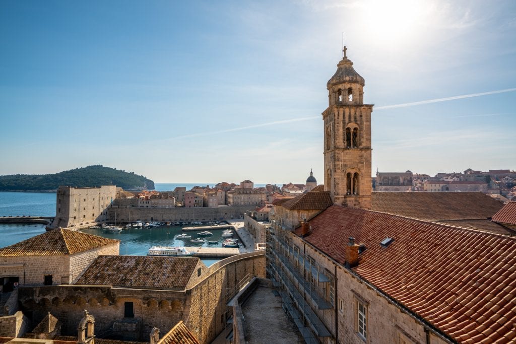 view of dubrovnik from city walls with harbor in the distance