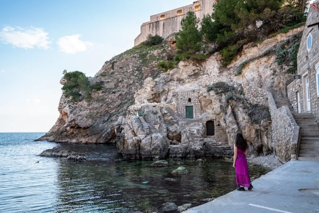 kate storm in front of west harbour doors, one of the hidden gems in dubrovnik