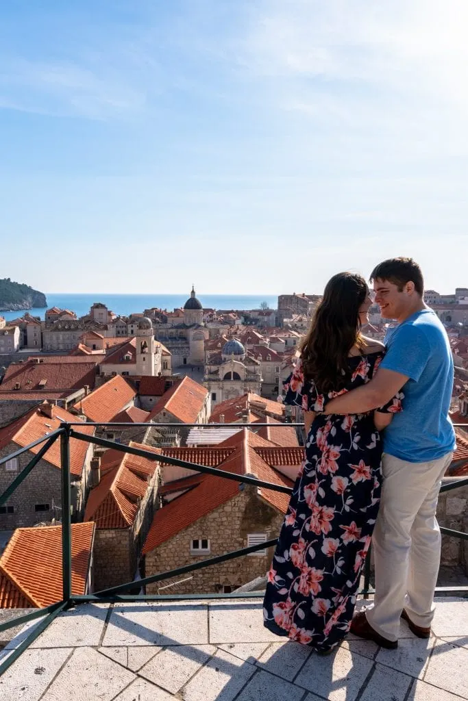 kate storm and jeremy storm overlooking dubrovnik from town walls, one of the most romantic places in europe to visit