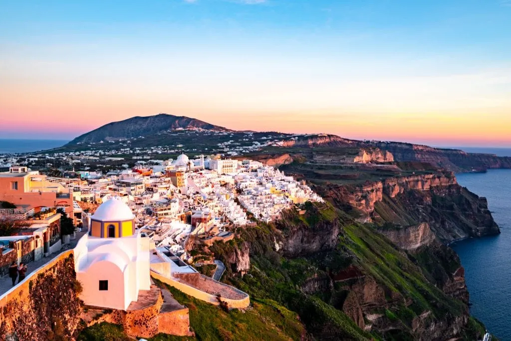 view of santorini village from above at sunset