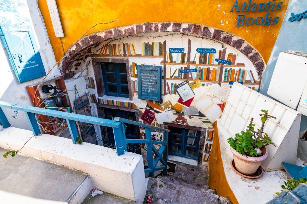 Exterior of Atlantis Books in Oia, one of the best bookstores in europe