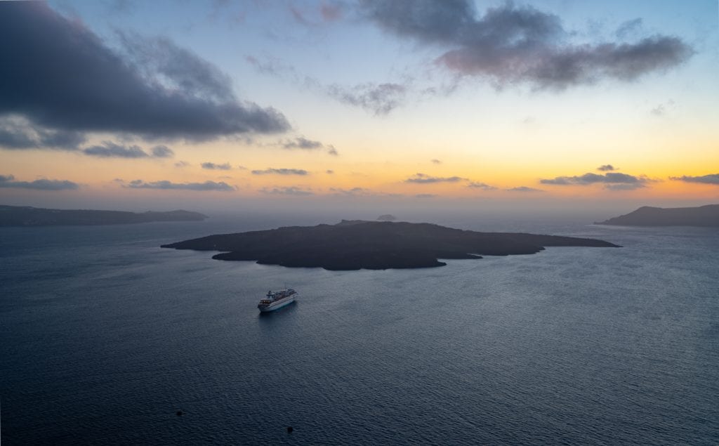 Sunset over Nea Kameni, as seen during a 3 day santorini itinerary