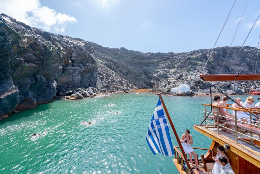 Boat near hot springs, Santorini Honeymoon