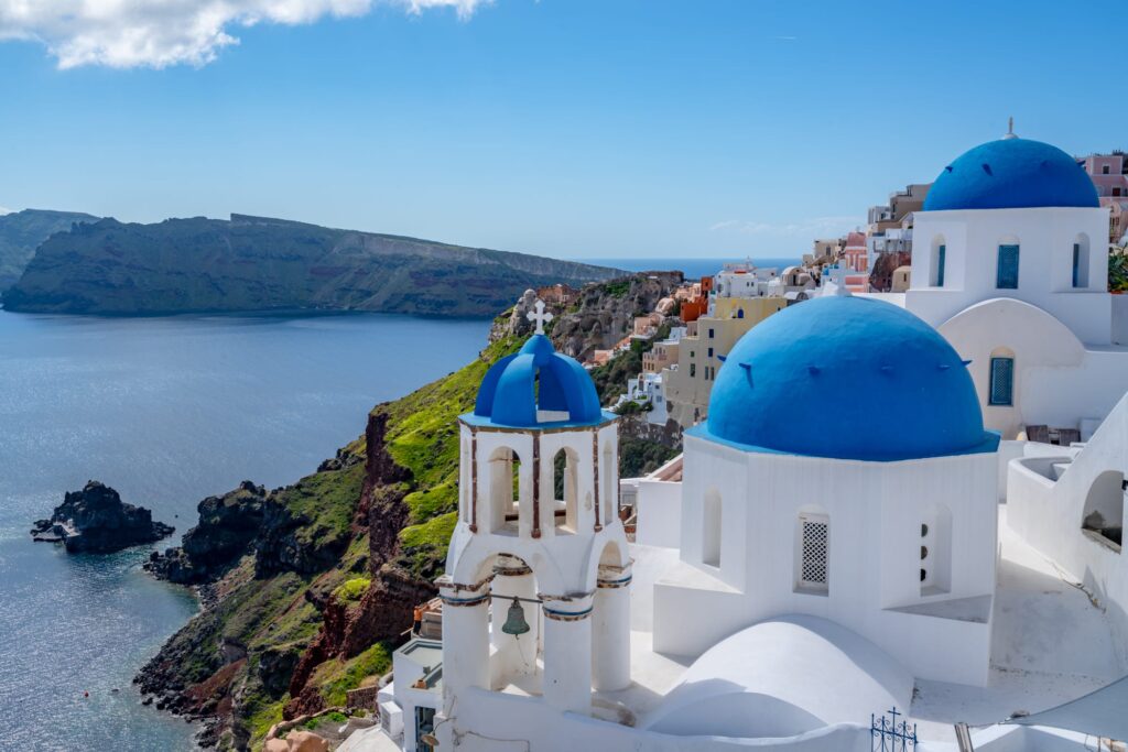 3 blue domes of Santorini--preparing dealing with putting together the right long flight essentials is definitely worth it to land somewhere like this!