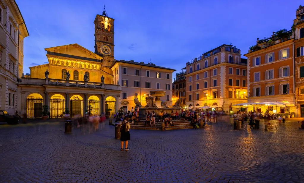 basilica di santa maria trastevere square during evening in rome italy