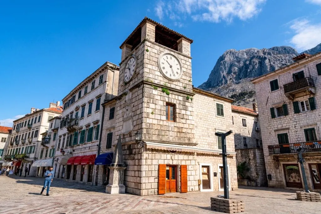 Clock tower in Kotor Montenegro--one of our travel tips for Europe is to get off the beaten path and find less-visited countries like Montenegro to visit!