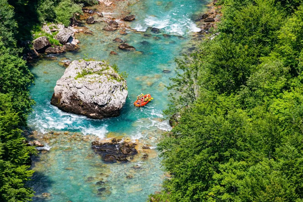 aerial view of orange raft in tara river canyon montenegro