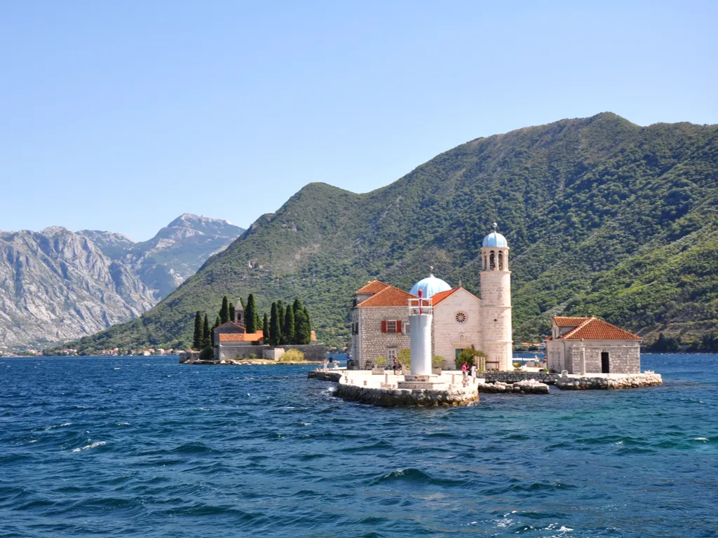 view of our lady of the rocks from across the bay in montenegro