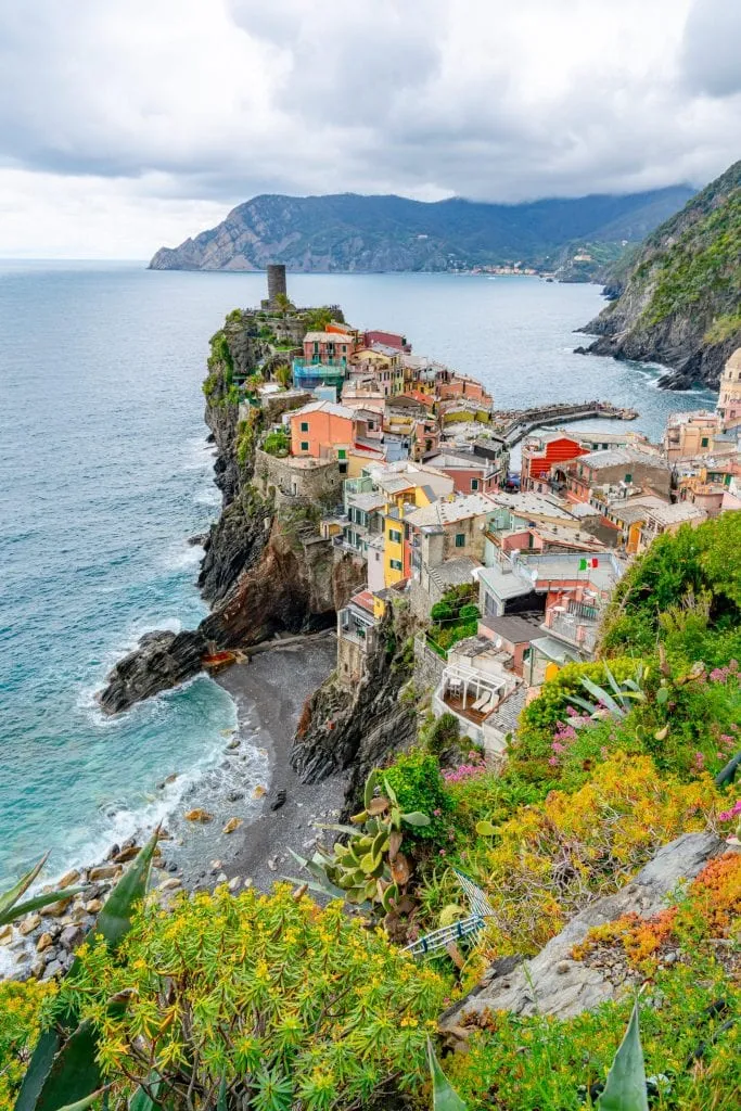 Photo of skyline of Vernazza when approaching from Corniglia: making sure to see this view is one of our Cinque Terre tips!