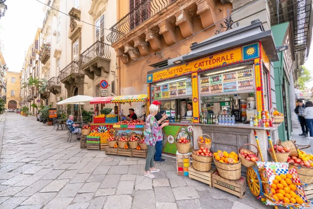 Fruit stand in with piles of oranges in Palermo, Sicily
