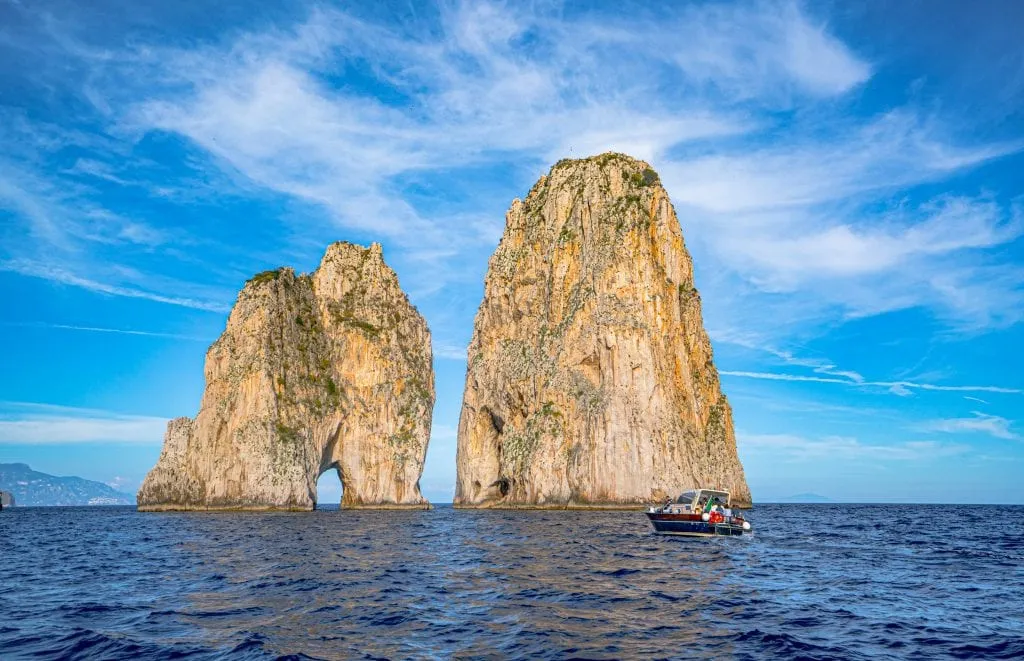 Faraglioni of Capri as seen on a boat tour while visiting the Amalfi Coast area.