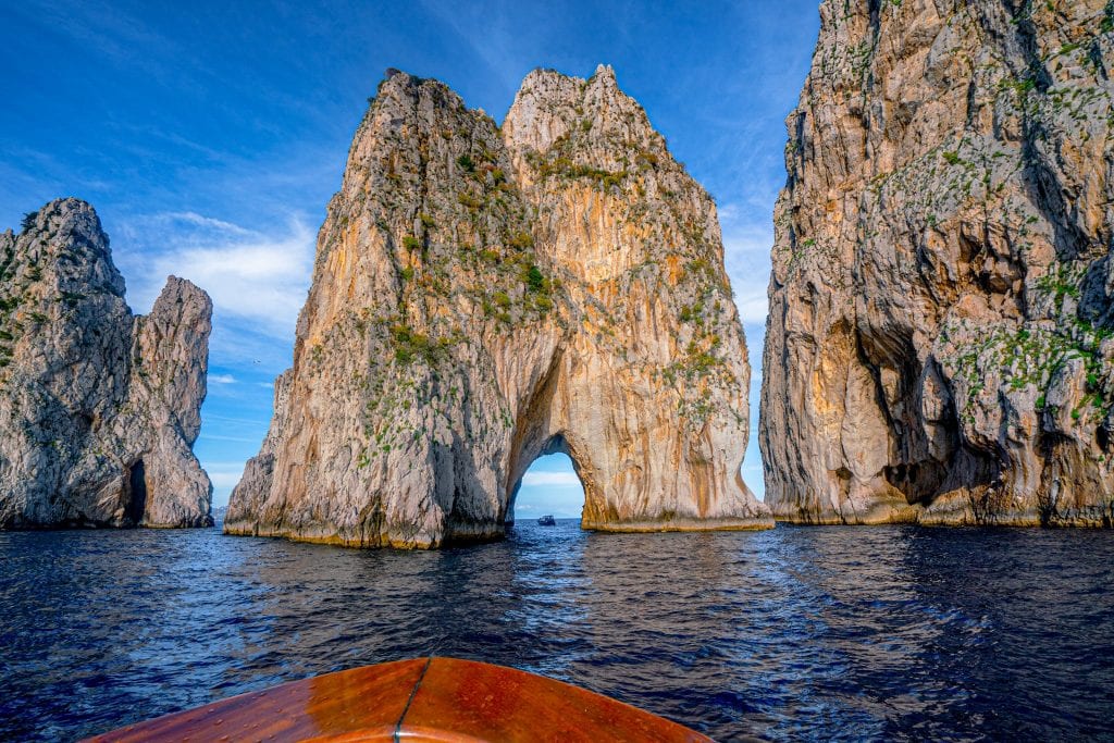 Faraglioni of Capri as seen on a boat tour while visiting the Amalfi Coast area.