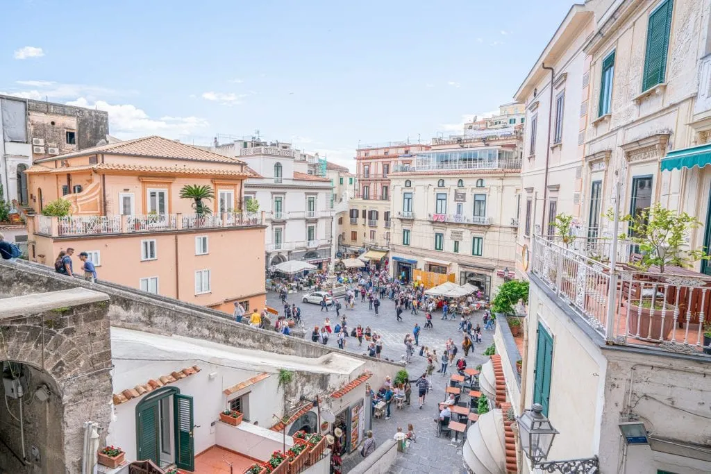 View of Piazza in Amalfi Town from above. The stairs to the Duomo are showing on the left side of the photo.