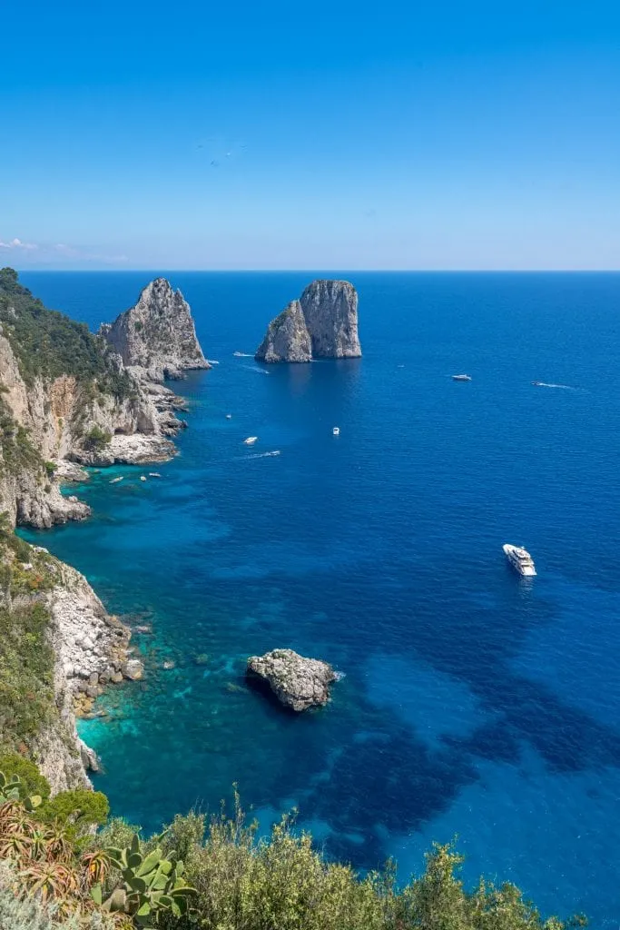 view of rock formations off of capri, northern italy vs southern italy visit