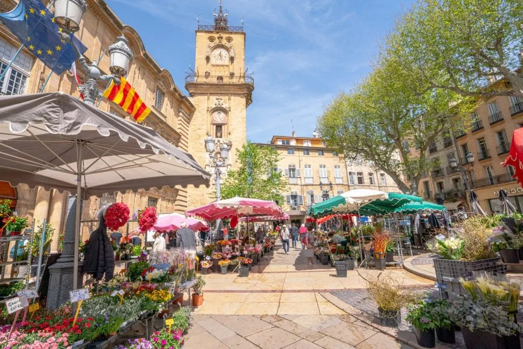 Flower market as seen in Aix-en-Provence during a south of France vacation--you can see a clock tower in the upper left of the photo.