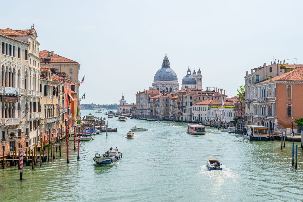 Photo of the view from Ponte d'Accademia in Venice taken on a cloudy day--don't miss this spot when visiting Venice in November!