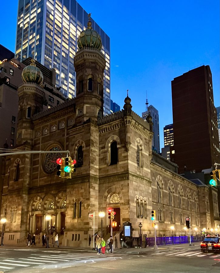 exterior of central synagogue in midtown manhattan new york city as seen from across the intersection during blue hour