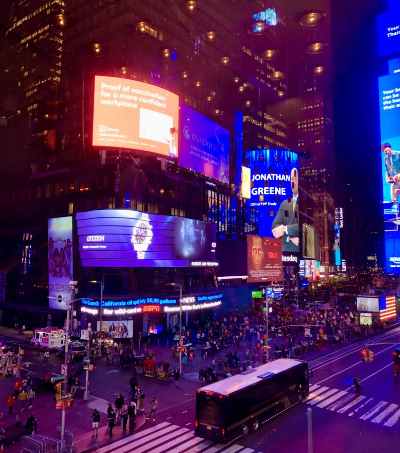 times square in nyc at night taken from theater lobby