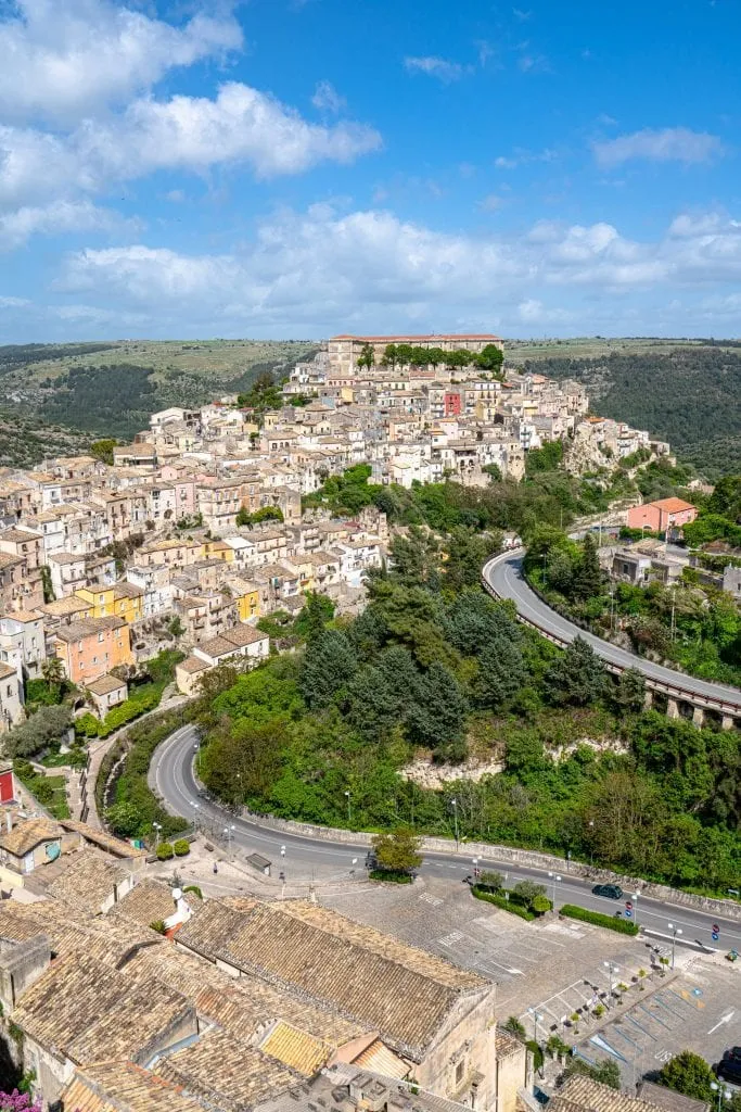 Winding roads in Sicily with Ragusa Ilba visible in the background, a must-see during 10 days in Sicily