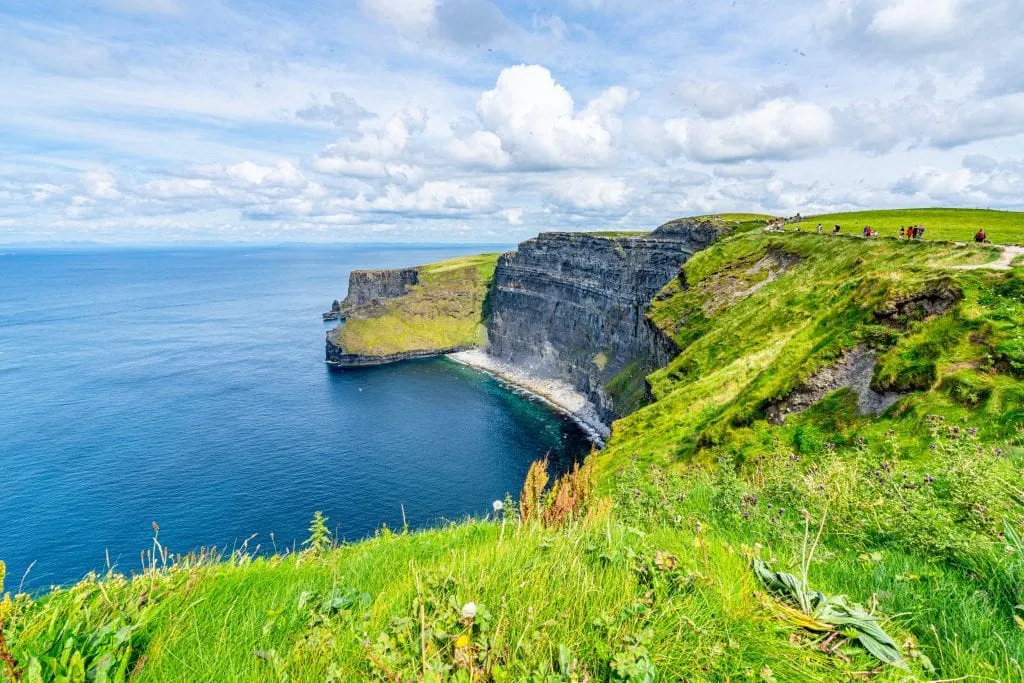 Small beach visible along the Cliffs of Moher in Ireland