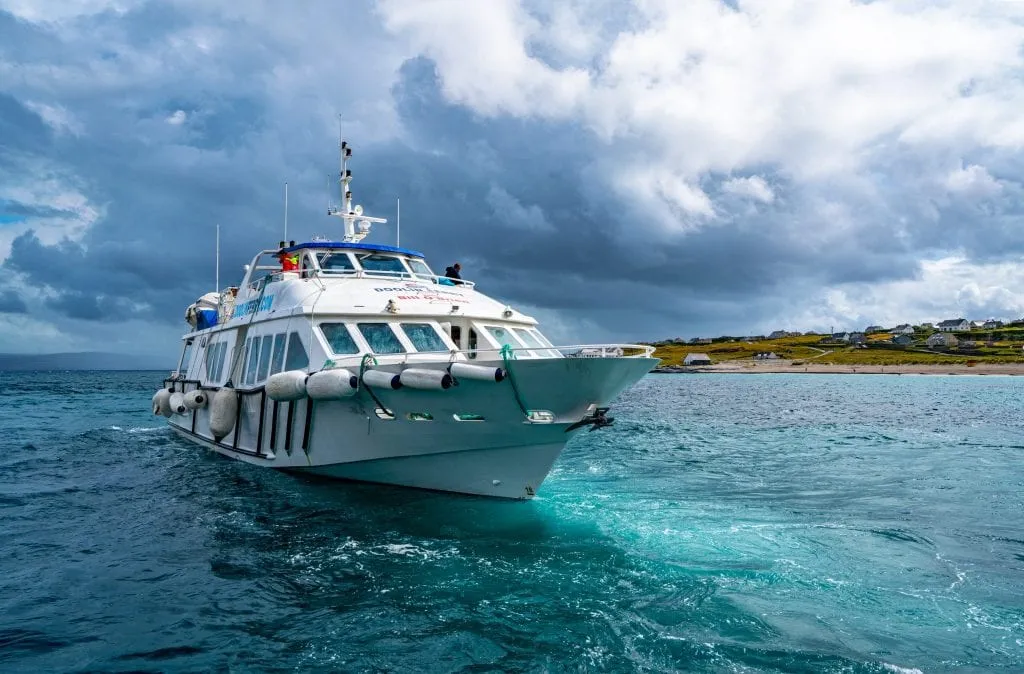 Ferry pulling into the harbor at Inisheer Ireland