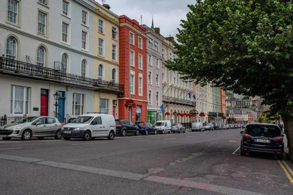 Photo of colorful buildings on a quiet street in Cobh Ireland