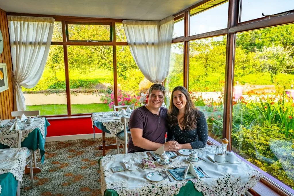 Kate Storm and Jeremy Storm sitting at a breakfast table at a bed and breakfast near Cork Ireland.