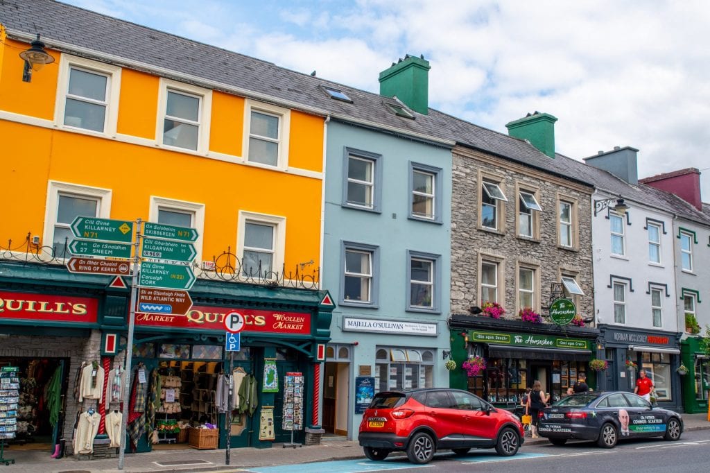 Colorful street in Kenmare Ireland with yellow building toward the left