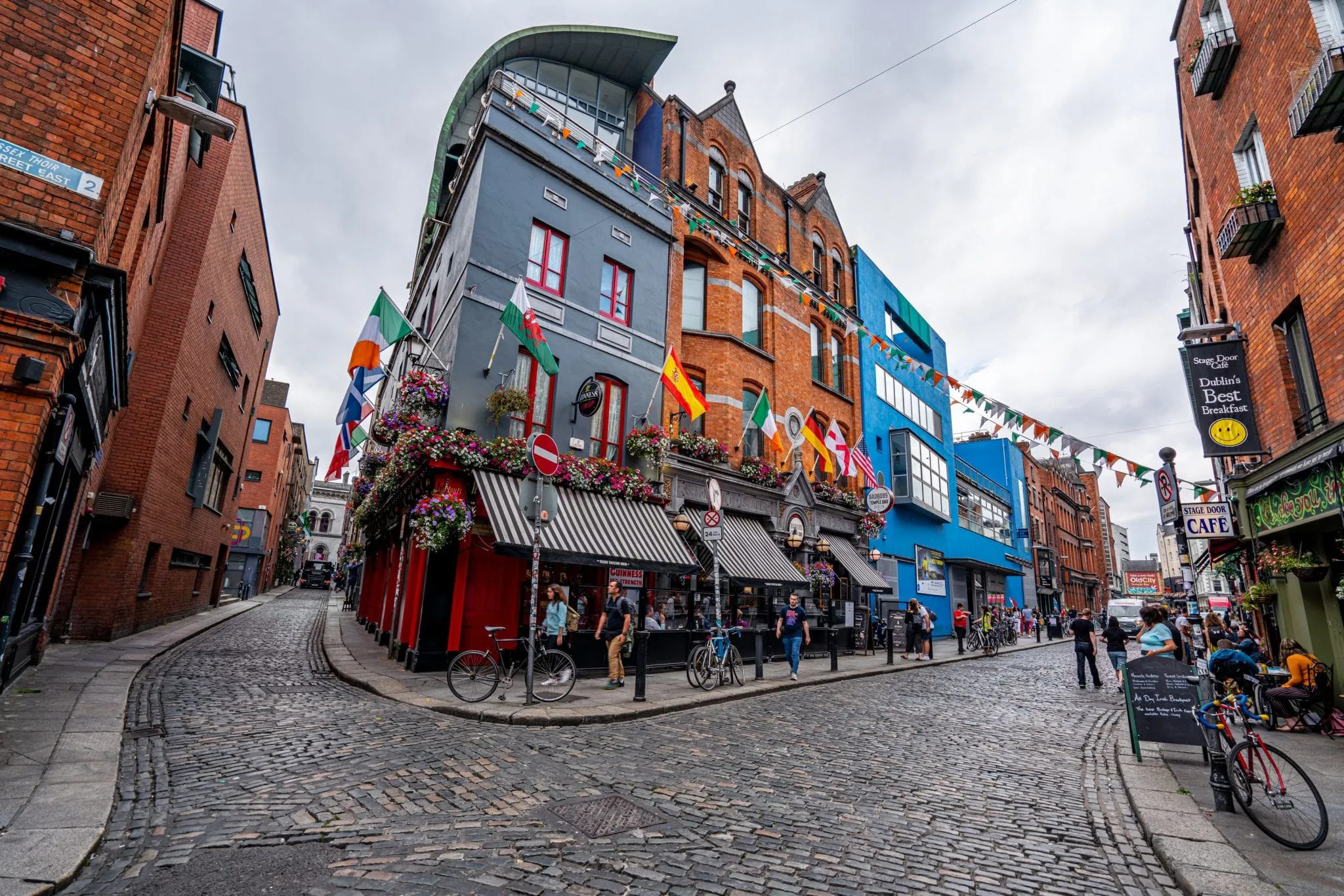 Cobblestone streets surrounding colorful buildings in Dublin Ireland
