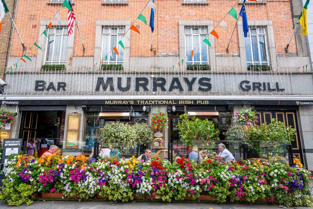 Photo of Murrays Grill in Dublin Ireland with colorful flowers out front