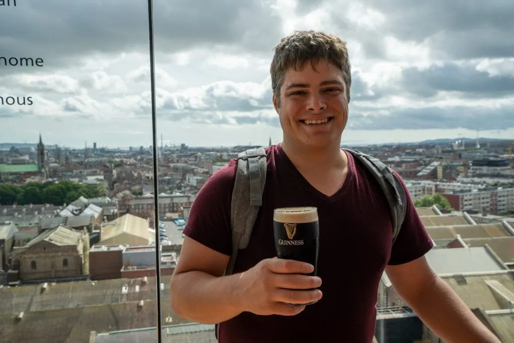 Jeremy Storm drinking a Guinness when spending a couple days in Dublin Ireland