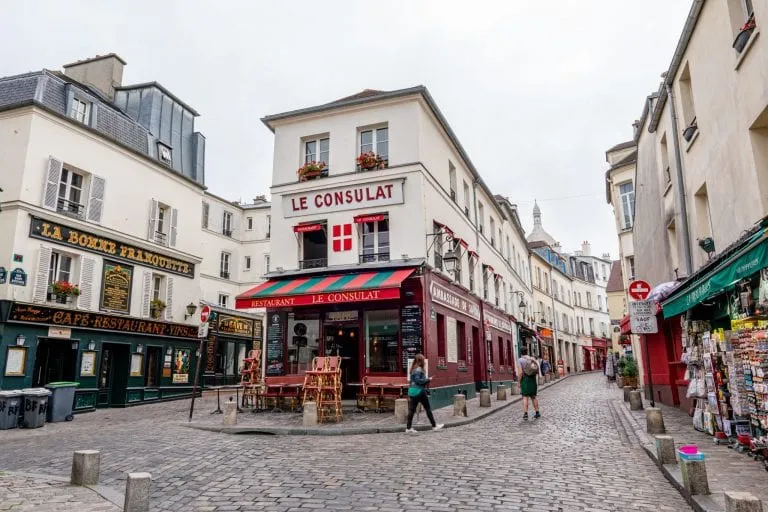 Le Consulat Cafe in Montmartre with no people in front of it, one of the most instagrammable places in Paris