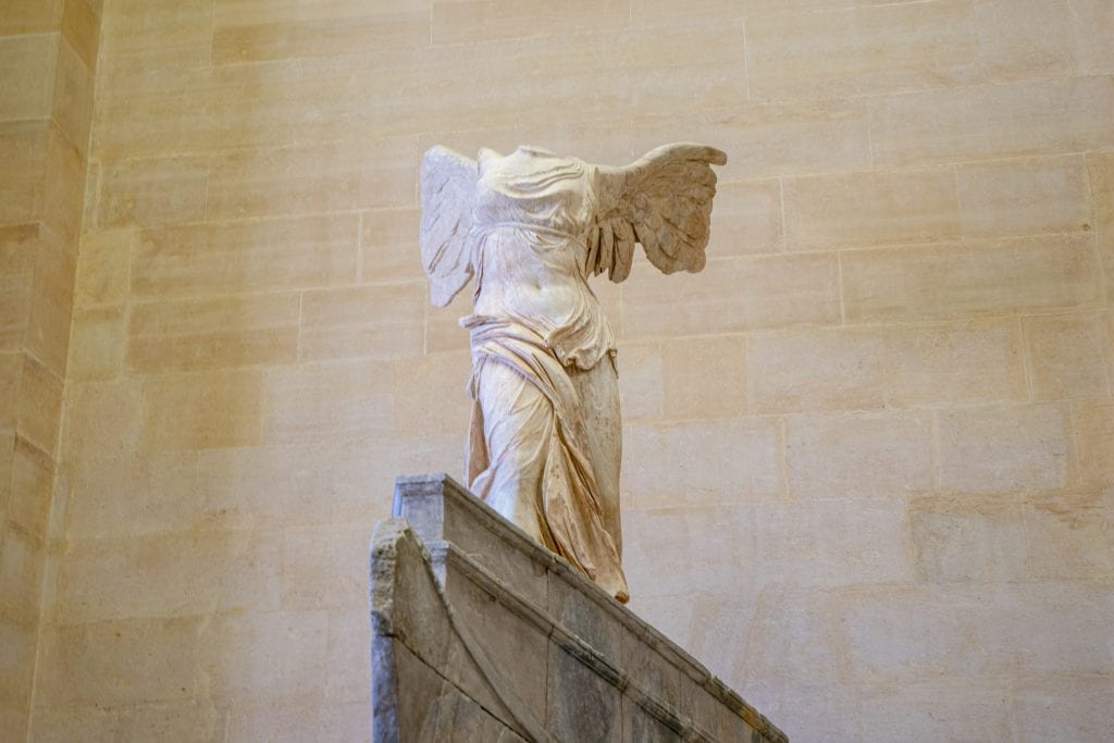 Winged Victory Statue in the Louvre--when calculating your trip to Paris cost, definitely try to budget to see the Louvre!