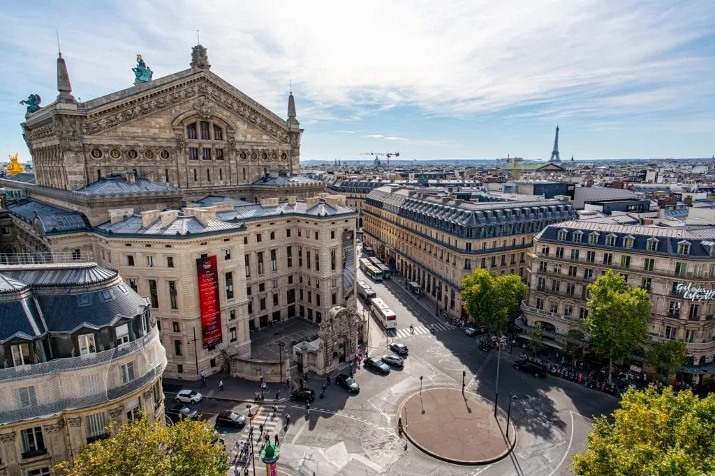 View from the Galeries Lafayette rooftop with the Eiffel Tower and Paris Opera House both visible--this rooftop terrace is an epic way to see views of Paris off the beaten path