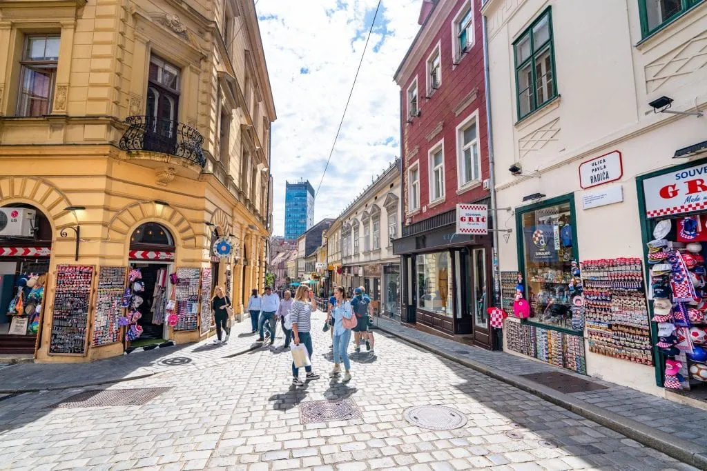 Pedestrian Street in Zagreb Croatia with a yello building on the left