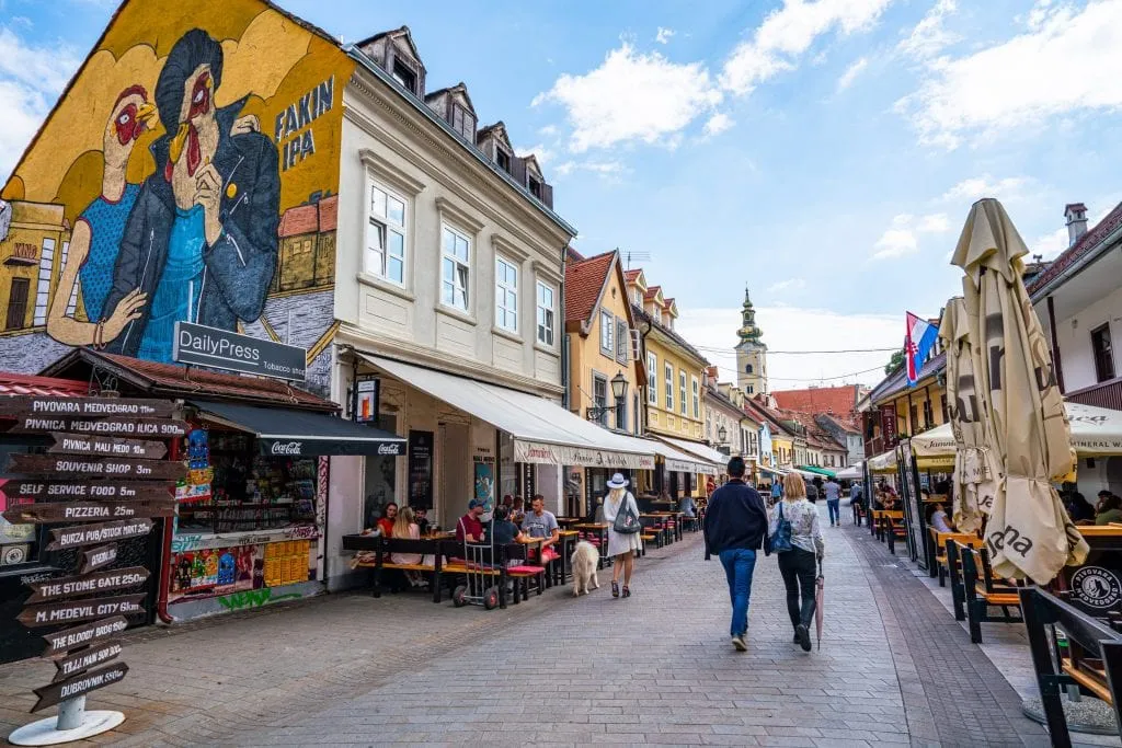 Tkalčićeva Street in Zagreb Croatia with a street-art piece of a chicken on the lefthand side of the photo