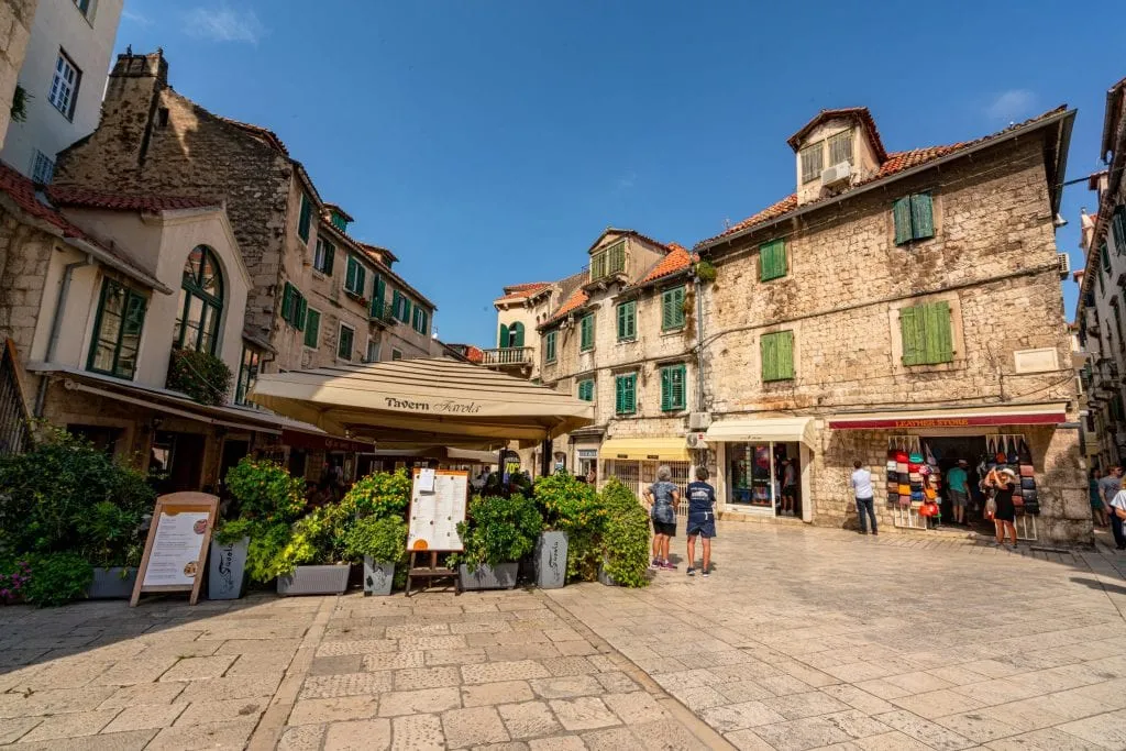 Photo of a quiet square in Split Croatia--wake up early to enjoy views like this during your one day Split itinerary!